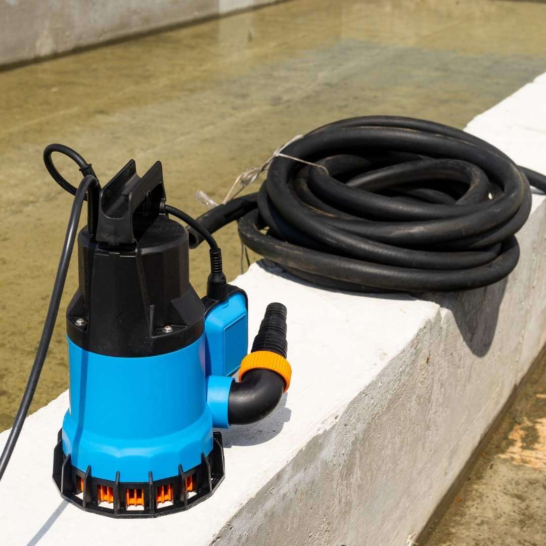 submersible_pump_on_concrete_wall.jpeg